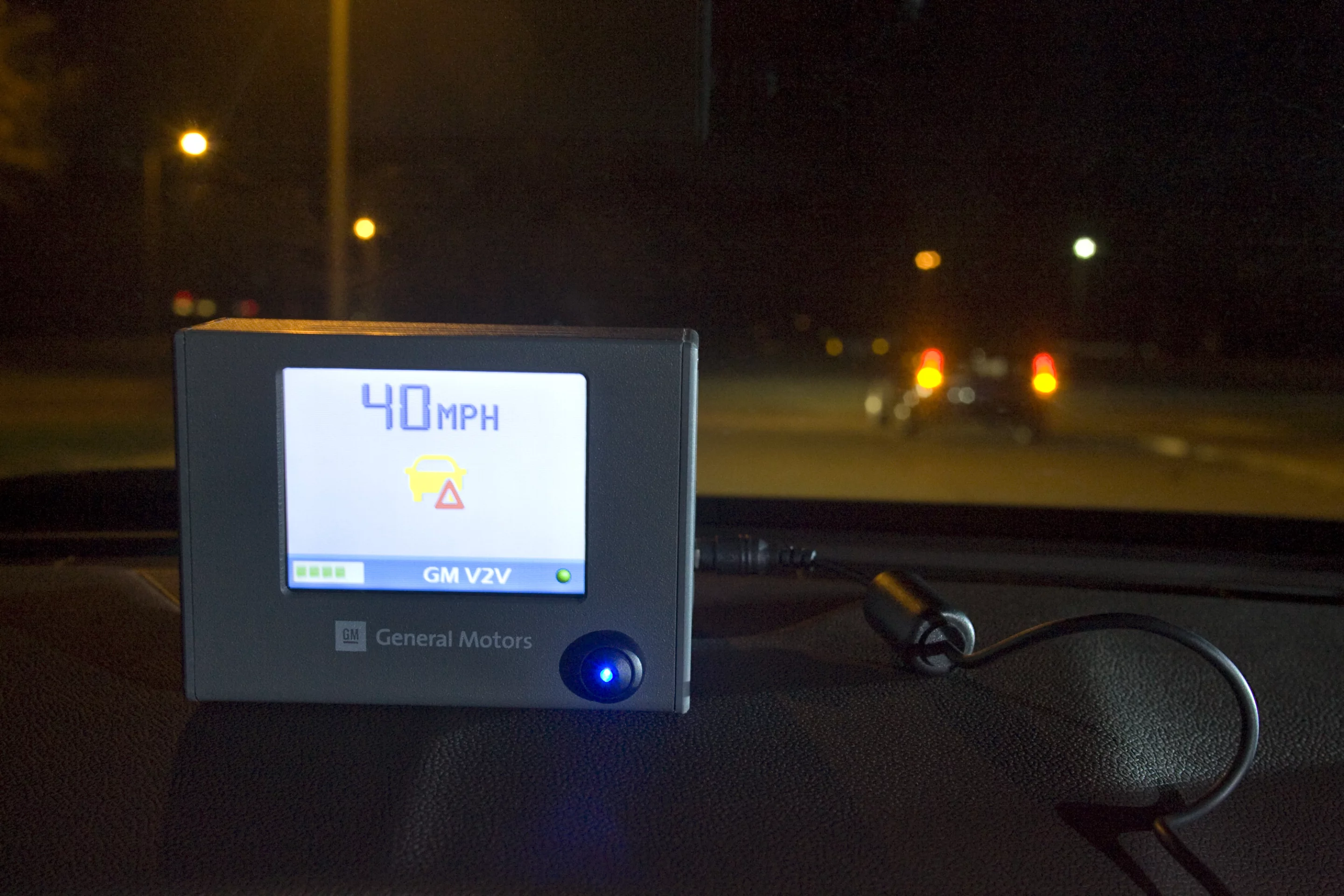 A portable device being tested by GM to enable vehicle-to-vehicle and vehicle-to-infrastructure communication