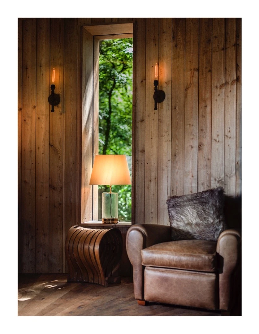 The Woodsman's Treehouse also includes some comfy-looking leather chairs in the main living area