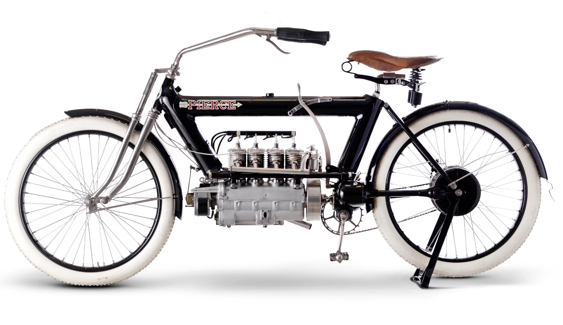 Pierce made America's first four-cylinder motorcycle, manufactured by the upmarket Pierce-Arrow Motor Car Company in Buffalo, New York. According to its makers, the Pierce would be "vibrationless, give motor car comfort and travel comfortably from a mere walking pace up to the speed of the motor car." It was not just its multi-cylinder engine that made the Pierce unusual; the frame too was novel, being constructed from 3½-inch diameter steel tubes that housed fuel and oil, and, like the FN, final drive was by shaft. Early models employed direct drive, but from 1910 onwards a two-speed gearbox was standard. Fast and well made, the Pierce soon had a string of city-to-city endurance race wins to its credit. The cost of the Pierce motorcycle ultimately led to its downfall. It cost $400 when production ceased in 1913, at which time the base Ford Model T automobile cost $525. Pierce fours are very rare and this example has been restored to a high standard. Some recent examples of this rare 1910 Pierce 688cc Four at auction include an original but completely unrestored 1909 Pierce Four which sold for US$161,000 at a Bonhams auction in San Francisco in November, 2007, a restored 1909 Pierce Four which sold for $115,500 in Las Vegas at the E.J. Cole Collection auction in March this year, and another restored 1911 Pierce Four which sold for £54,300 (US$89,638) at the Stafford Spring auction in April, 2011. This 1910 Pierce 688cc Four fetched £63,100 ($97,424) as lot 21 at Bonhams Lonatti Collection held on 17 October, 2015