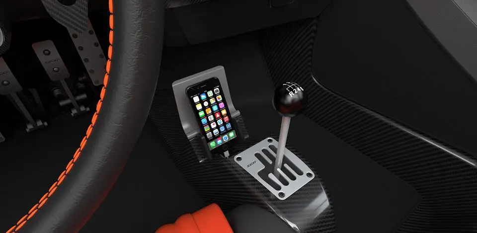 A smart phone dock in front of the purposeful shift gate in the SCG 004S