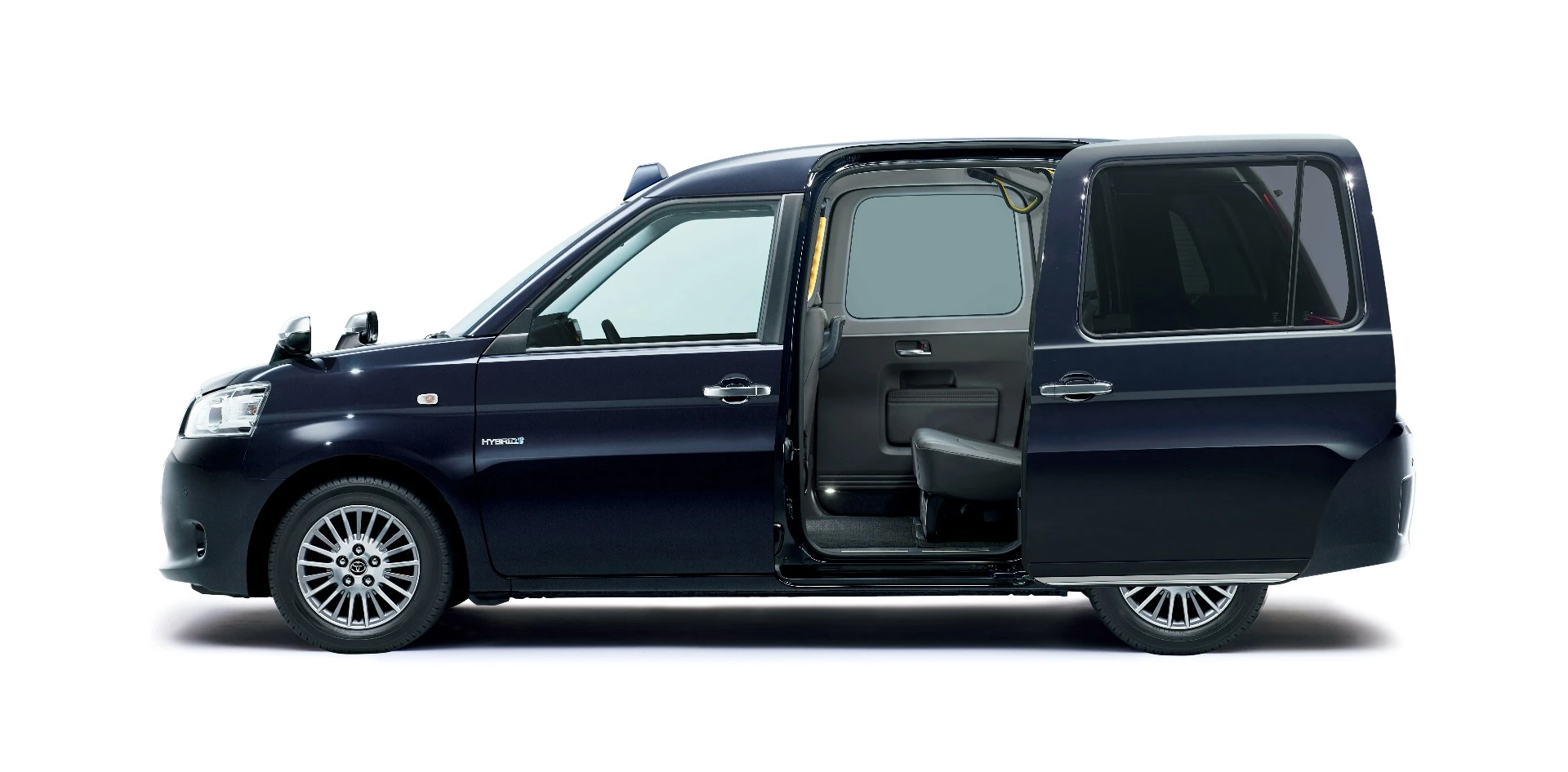 The left-side rear door slides open to allow a large entrance for the JPN Taxi and can include an integrated wheelchair ramp for access