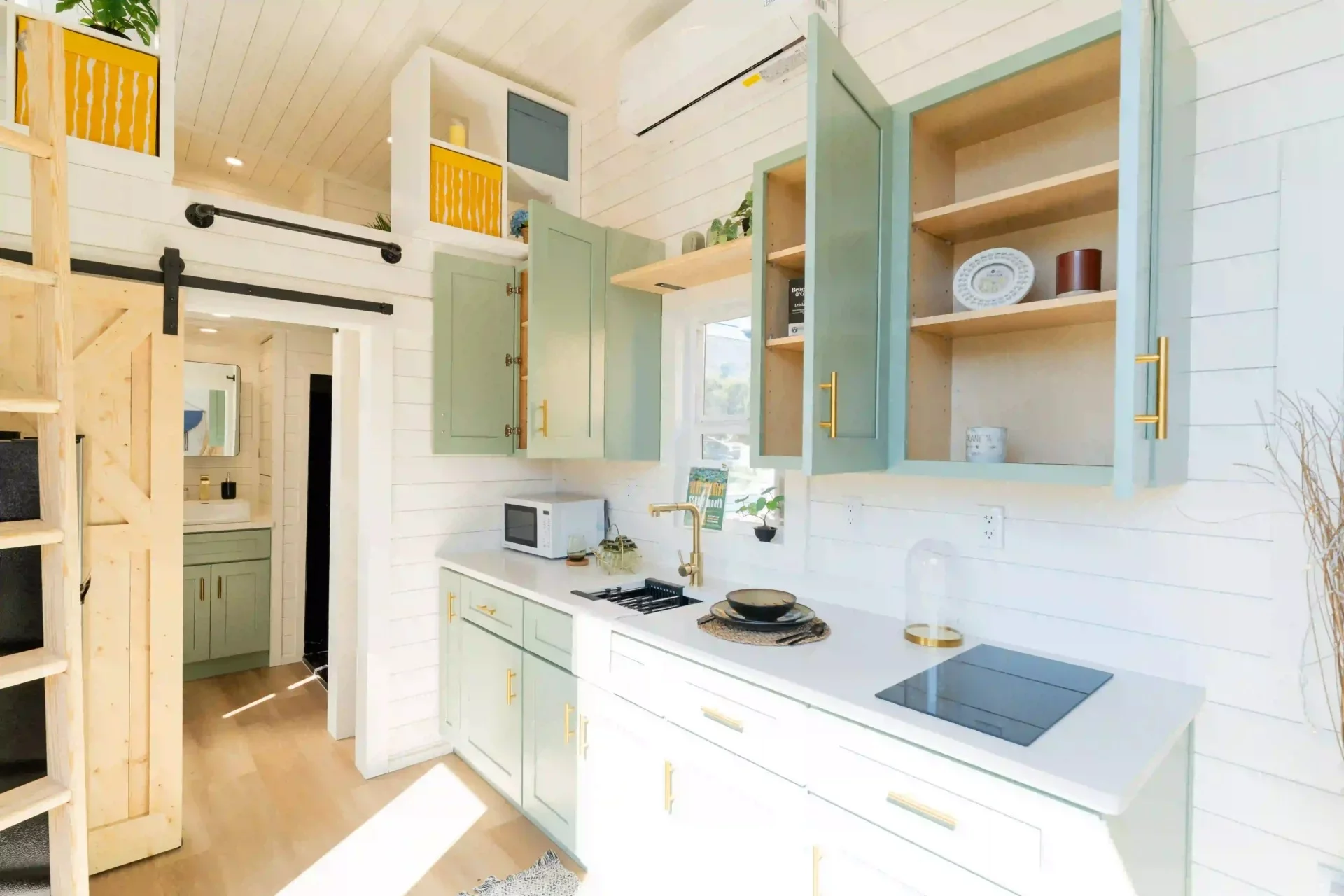 The interior of the Avalon 32' is arranged around a central kitchen