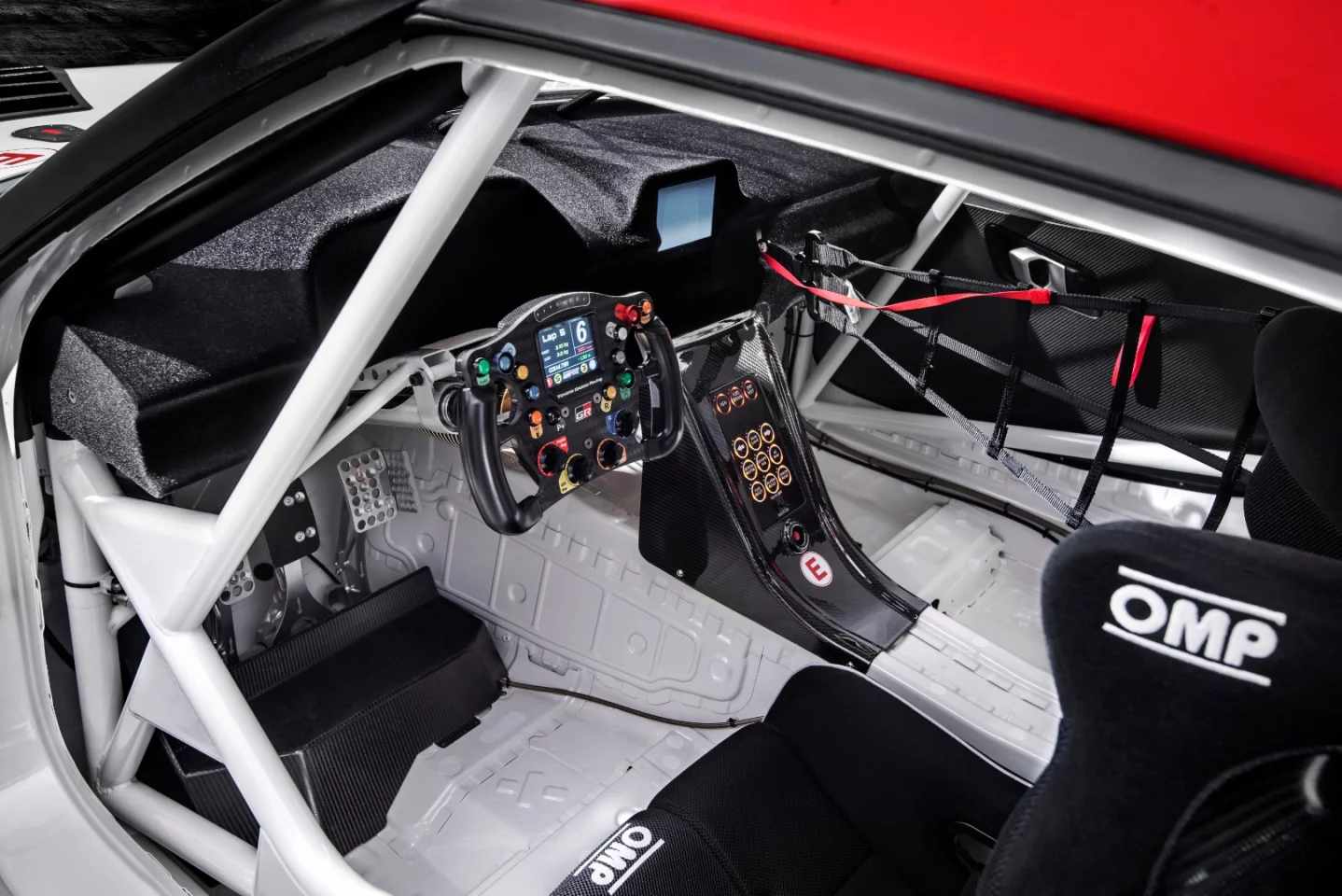 The cockpit's roll cage and accessories are all designed for racing specifications in the Toyota GR Supra Racing Concept