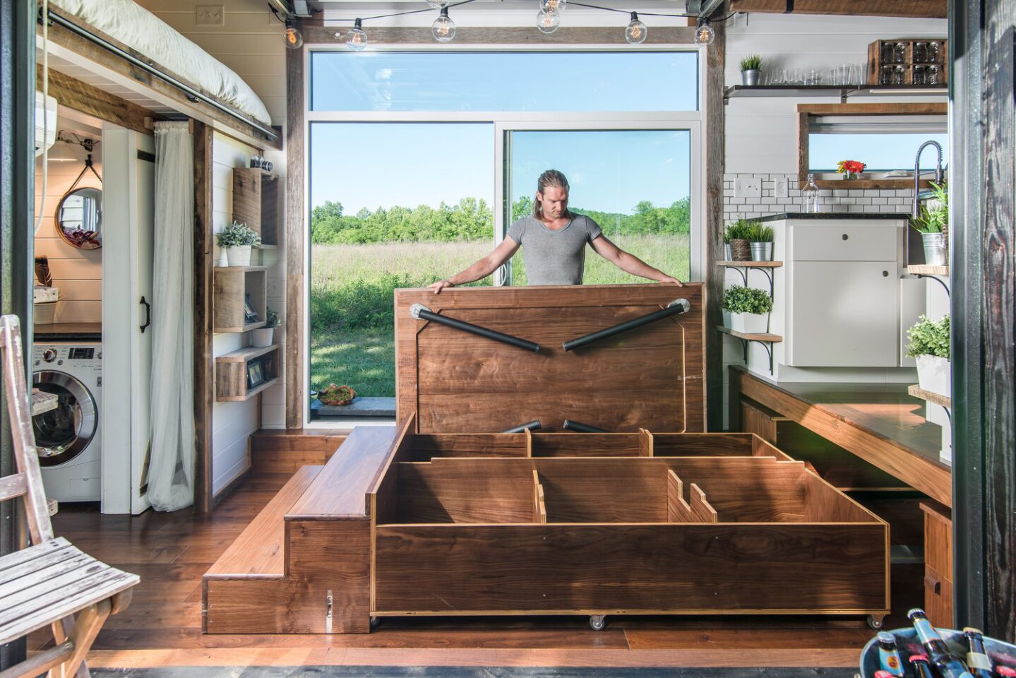 Pulling out the large eight-person dining table and bench seats