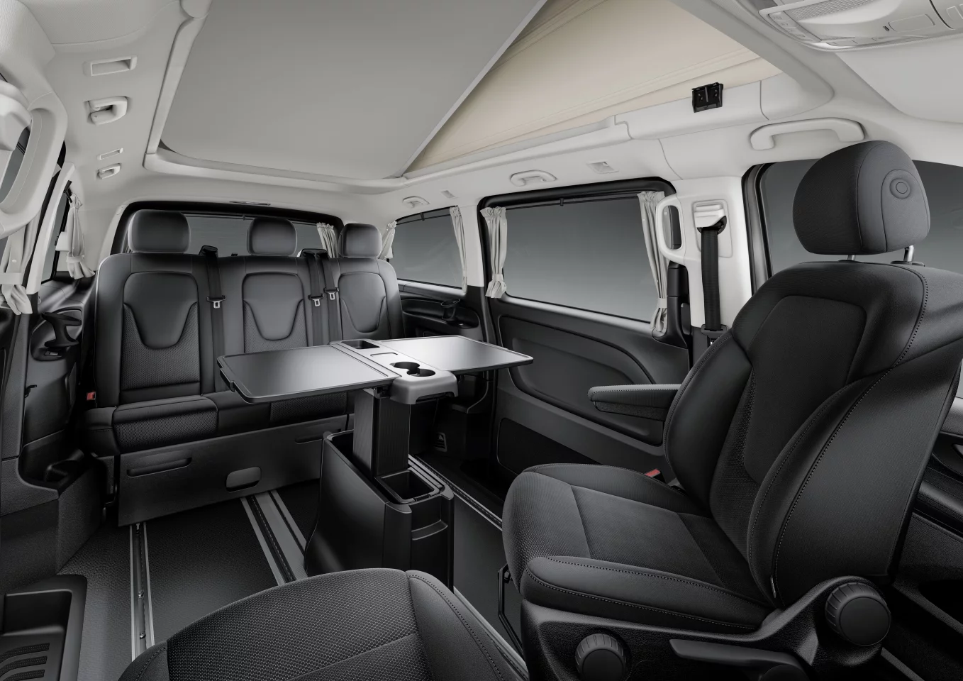 A three-seat rear bench/bed, swivel front seats and retractable table create a dining lounge