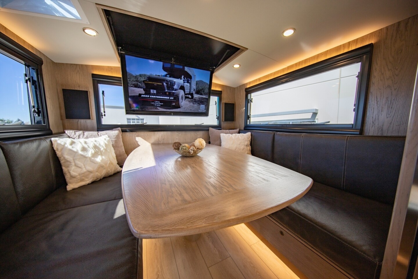 How many vehicles can disappear you off the topographic map, then treat you to movie night in a mobile media room?