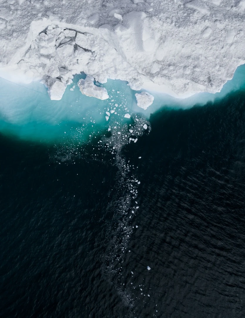 The Iceberg Series II, looks directly down on icebergs, marveling at their abstract patterns and shapes
