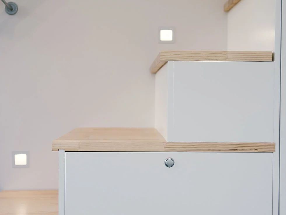 The Buster Tiny House's storage-integrated staircase