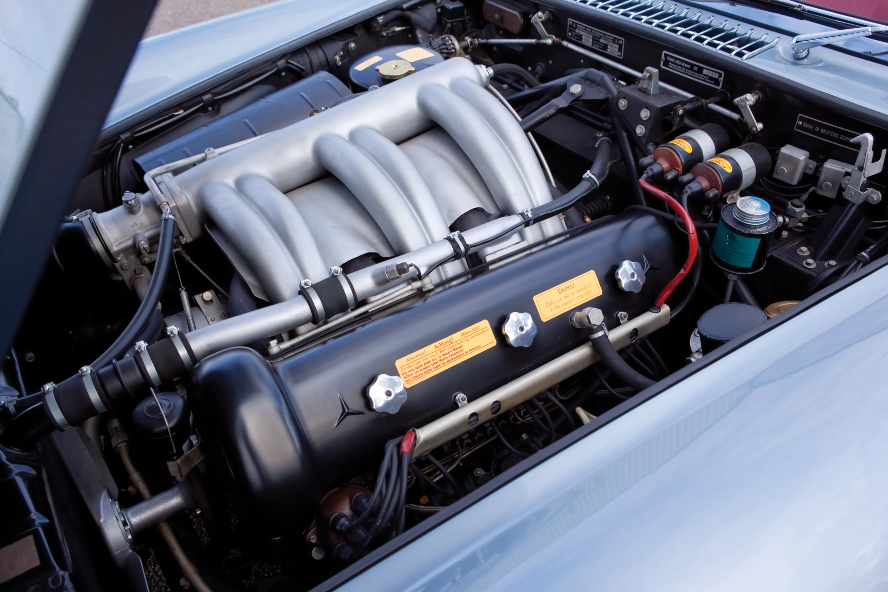 The 300 SL Roadster runs on a 215 bhp (DIN), 240 hp (SAE), 2,996 cc overhead-camshaft inline six-cylinder engine