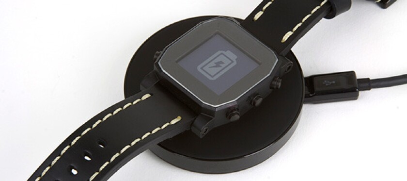 The Agent charges wirelessly via a Qi charging pad