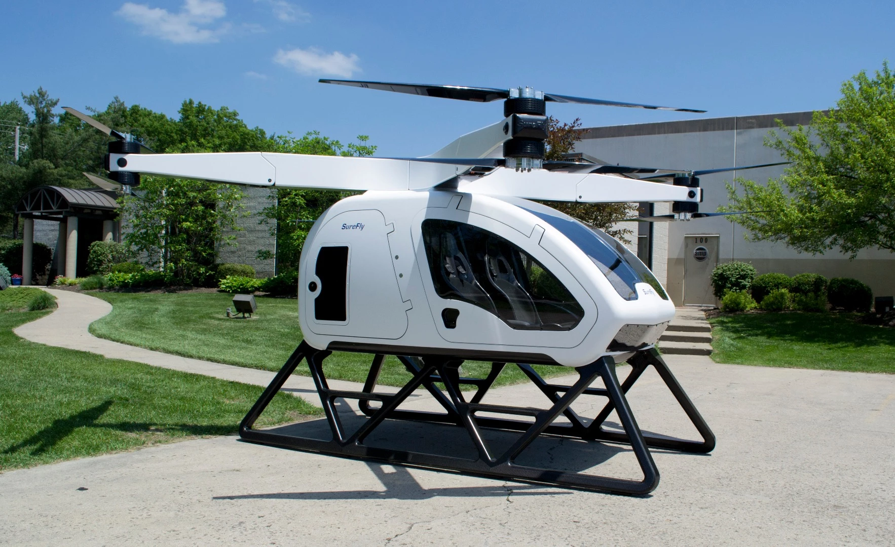The 1,100 kg Workhorse Surefly uses an electric quadcopter layout with two contra-rotating propellers on each corner and a range-extending petrol engine, giving it a range of 70 miles and a top speed of 70 mph.