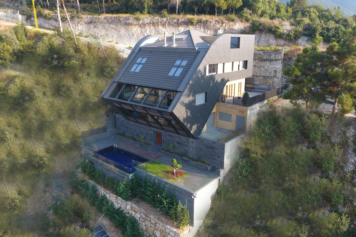 The CH730 Villa is located on a steep hillside plot in Lebanon
