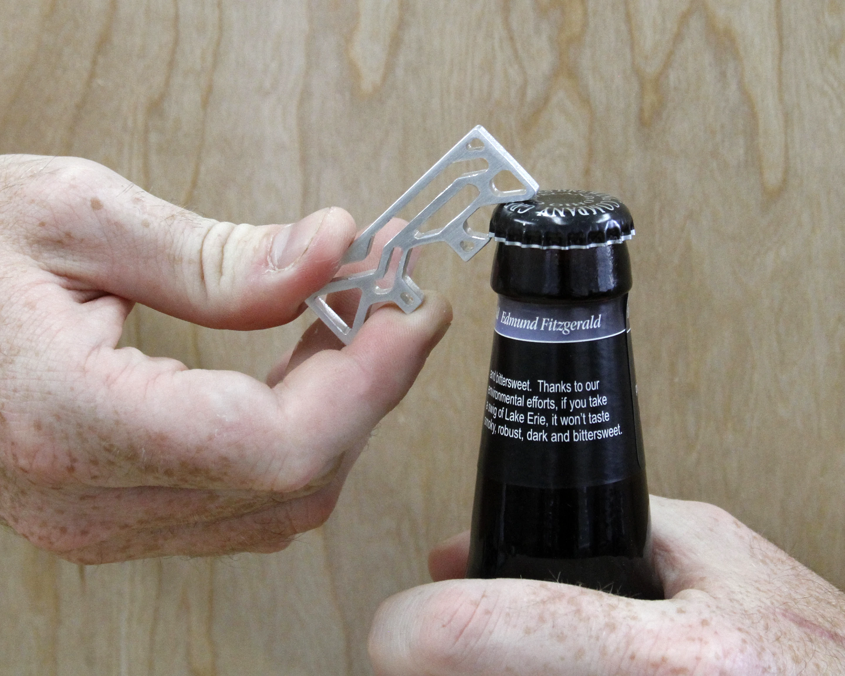 A bottle opener created with Carvey