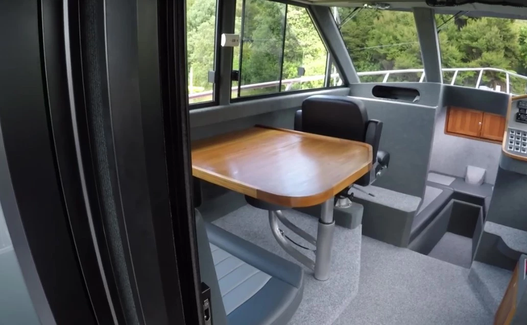 The dining area inside the 12m Cabin RIB