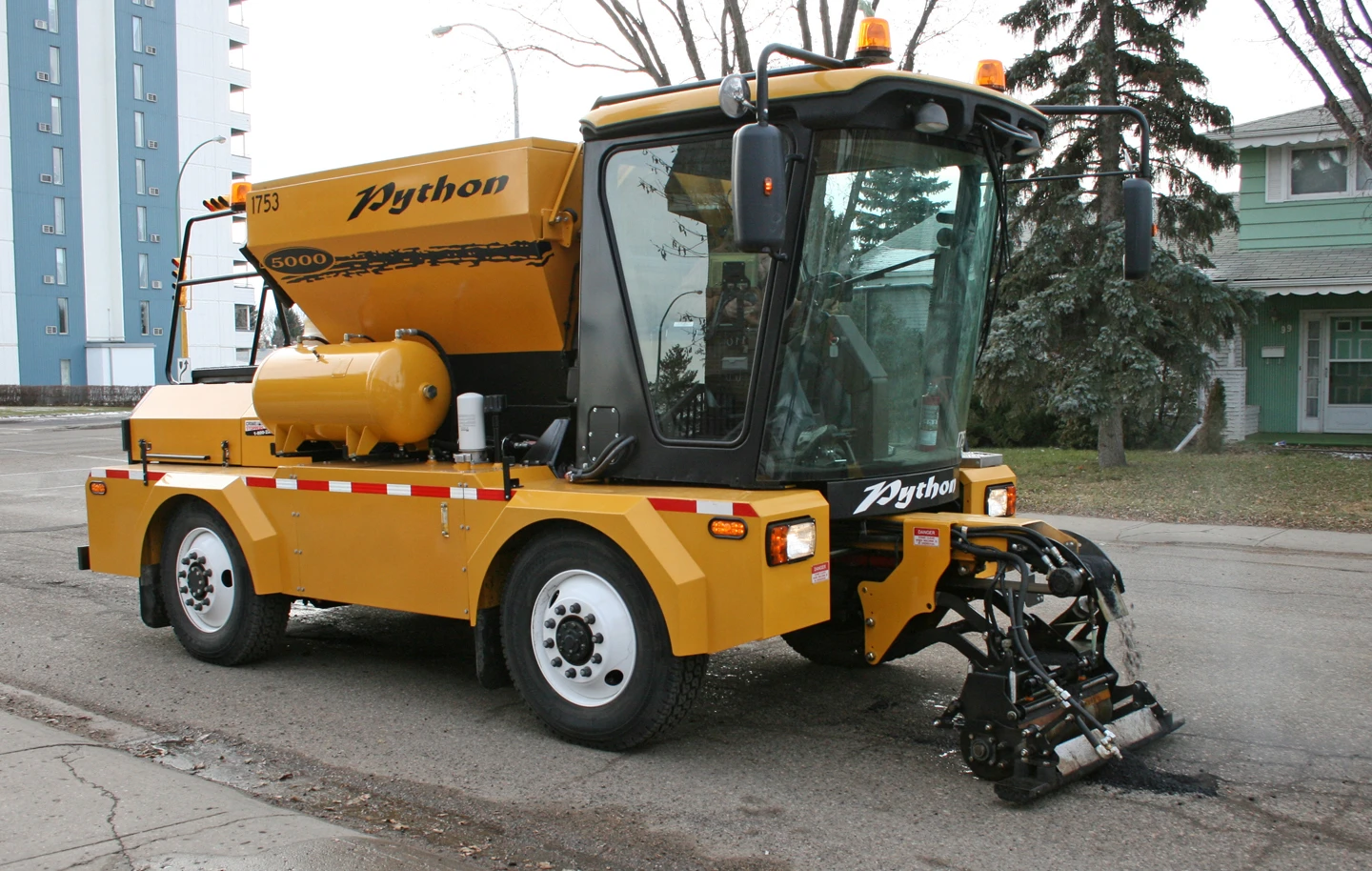 The Python 5000's single operator can quickly fill potholes from within the vehicle's cab