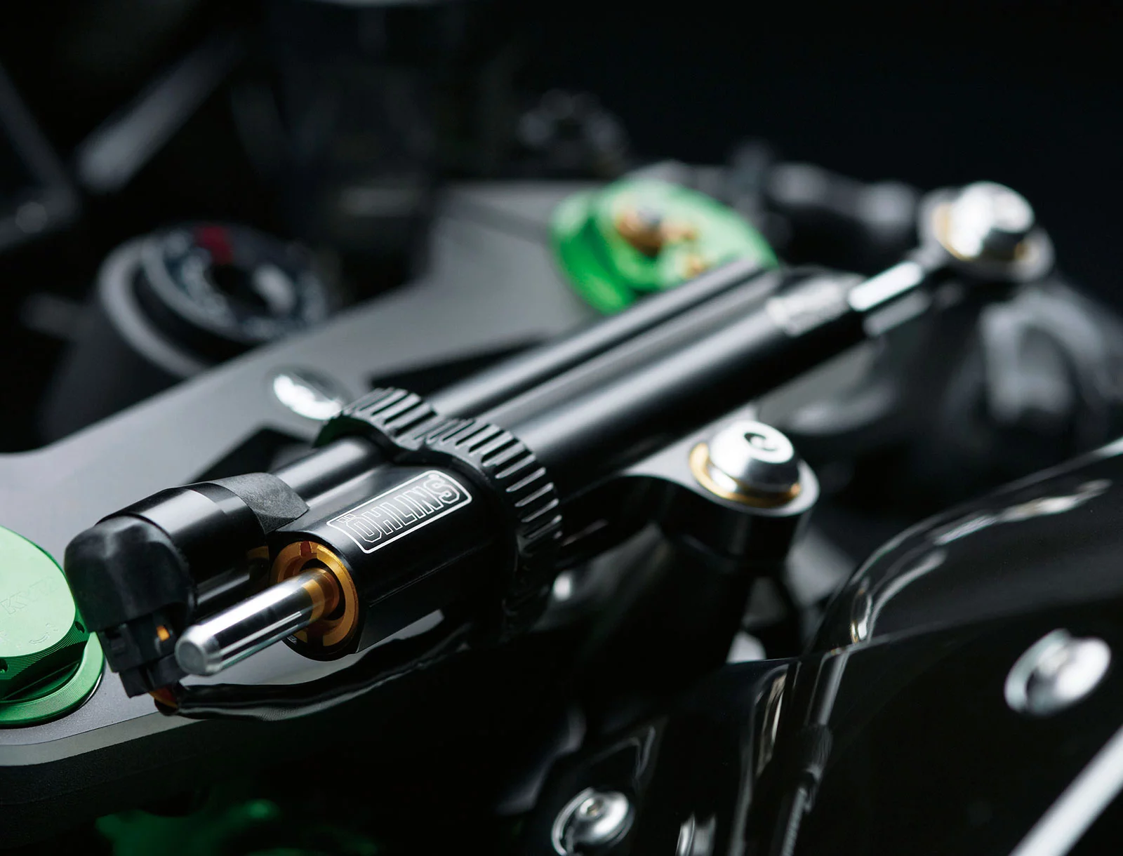 The electronic steering damper was jointly developed with Öhlins, and provides damping appropriate for the exact circumstance. Mechanical steering dampers are fixed at one setting which must cover all riding conditions and speeds. By changing the damping electronically according to vehicle speed and acceleration, the damping does not interfere with the bike’s intrinsic lightweight handling, yet provides enhanced stability at speed.