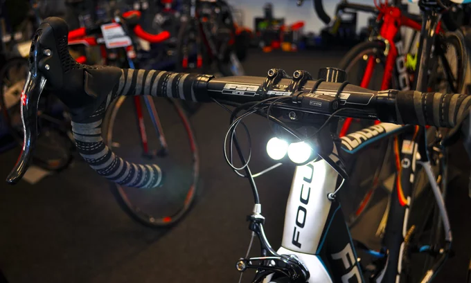 The Ding mounts on the underside of the handlebars