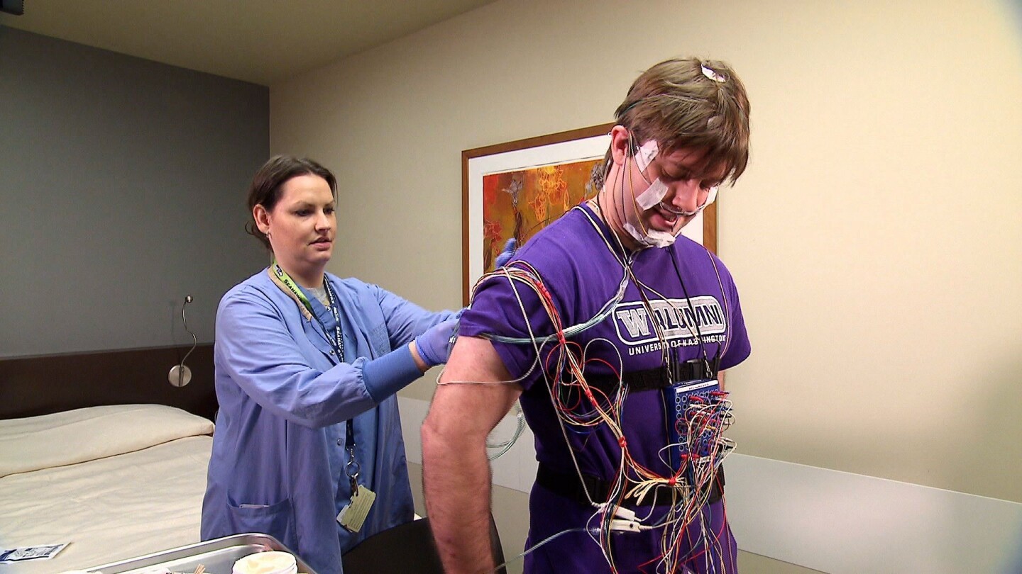 Doctors typically use a polysomnography test, which requires a patient to sleep overnight in a hospital or clinic while hooked up to dozens of sensors, to diagnose sleep apnea today (Photo: University of Washington