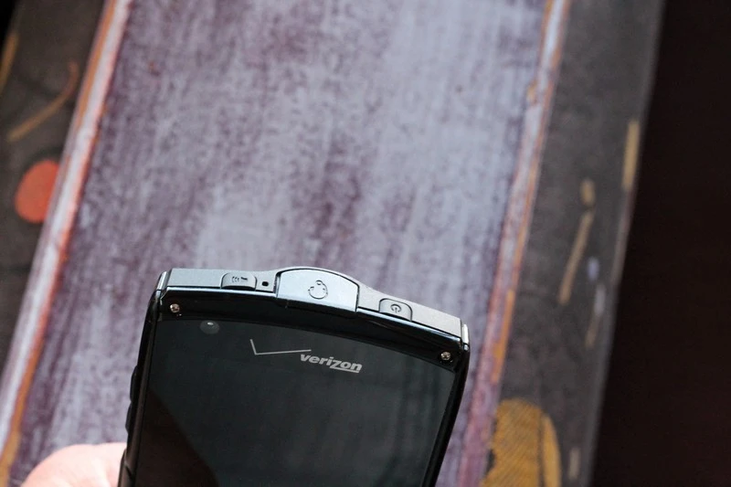 A speakerphone button is a unique feature