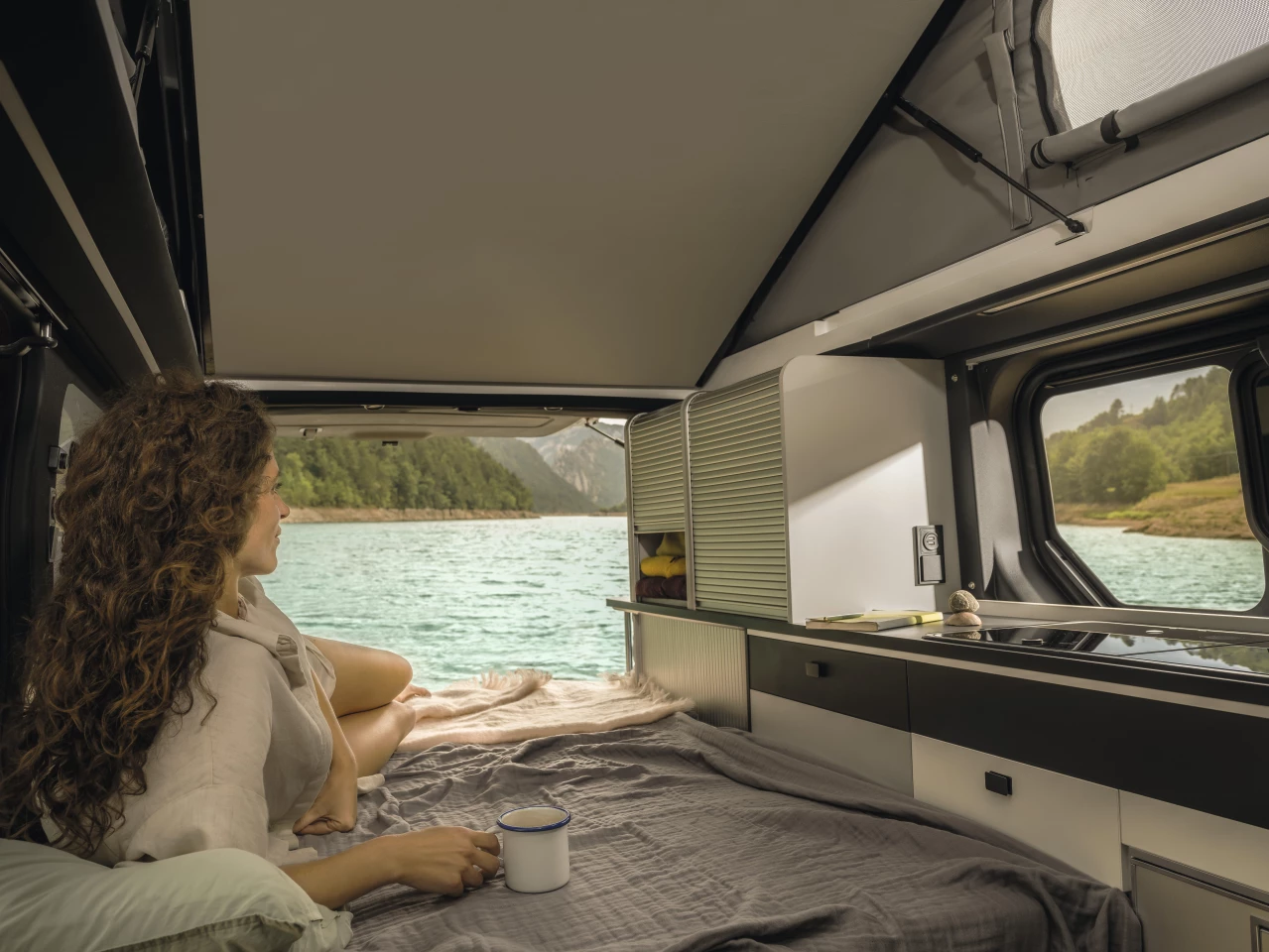 The SpaceNomad's rear seating bench folds into a 49 x 74-in bed