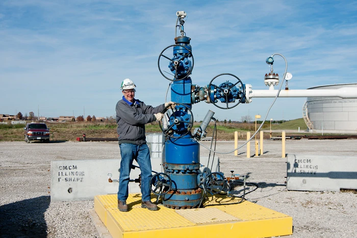 IBDP director Robert Finley turns the main carbon dioxide valve (Photo: Daniel Byers, Illinois State Geological Survey)