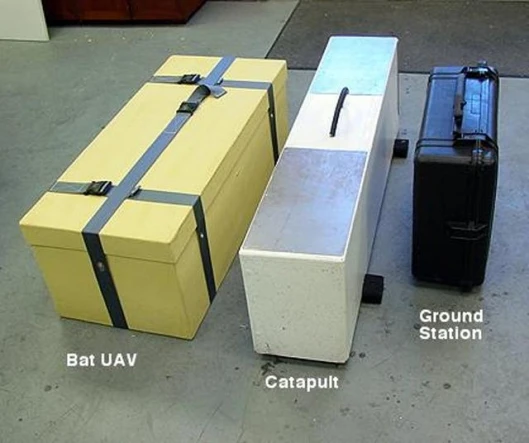 Bat system packaged for shipping.