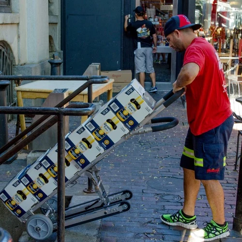 Glyde was designed by engineers at MIT to help drivers deliver kegs and cartons of beer to bars, which are often stored in cellars with no elevator access