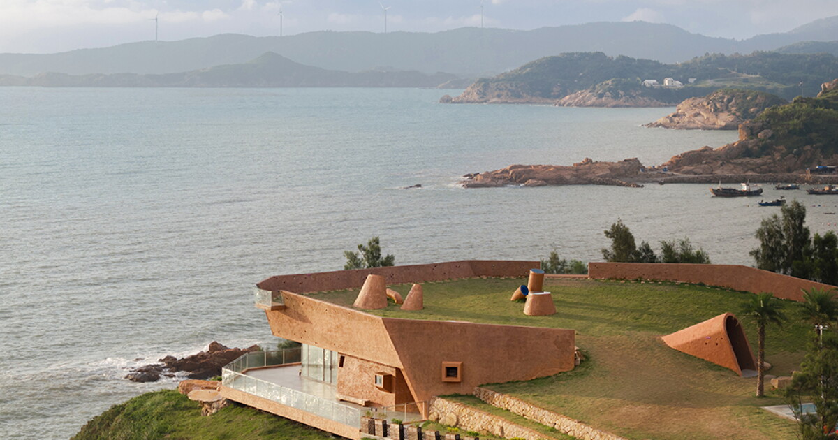 Chinese architects carve event space into a cliffside