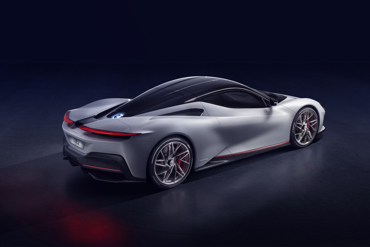 Like folded-back wings, the rear panels wrap around and blend into the active aero spoilers