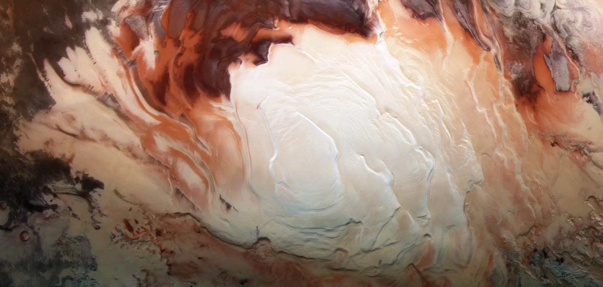 The bright white region of this image shows the icy cap that covers Mars’ south pole