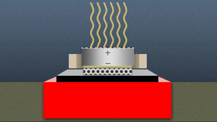 Researchers have developed a coating that prevents a battery from conducting electricity when swallowed (Image: Christine Daniloff/MIT)
