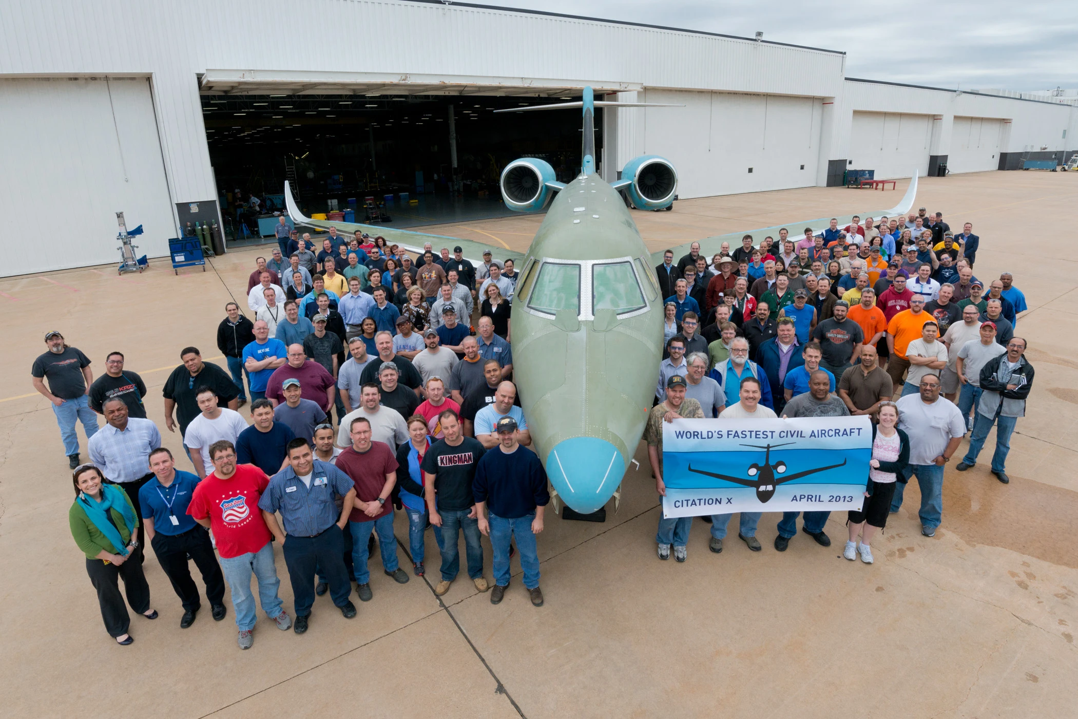 Cessna employees celebrate the first production new Citation X