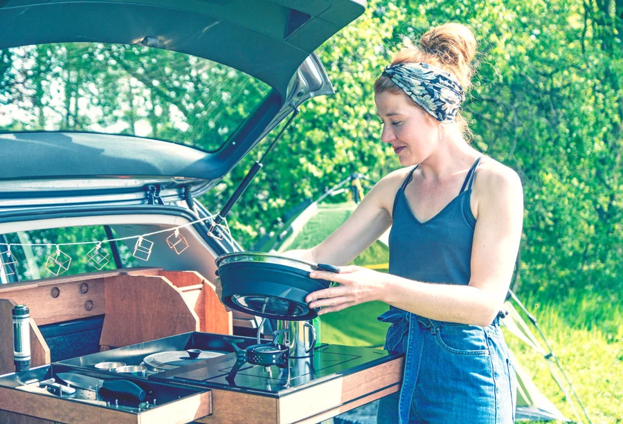 Preparing a meal at camp