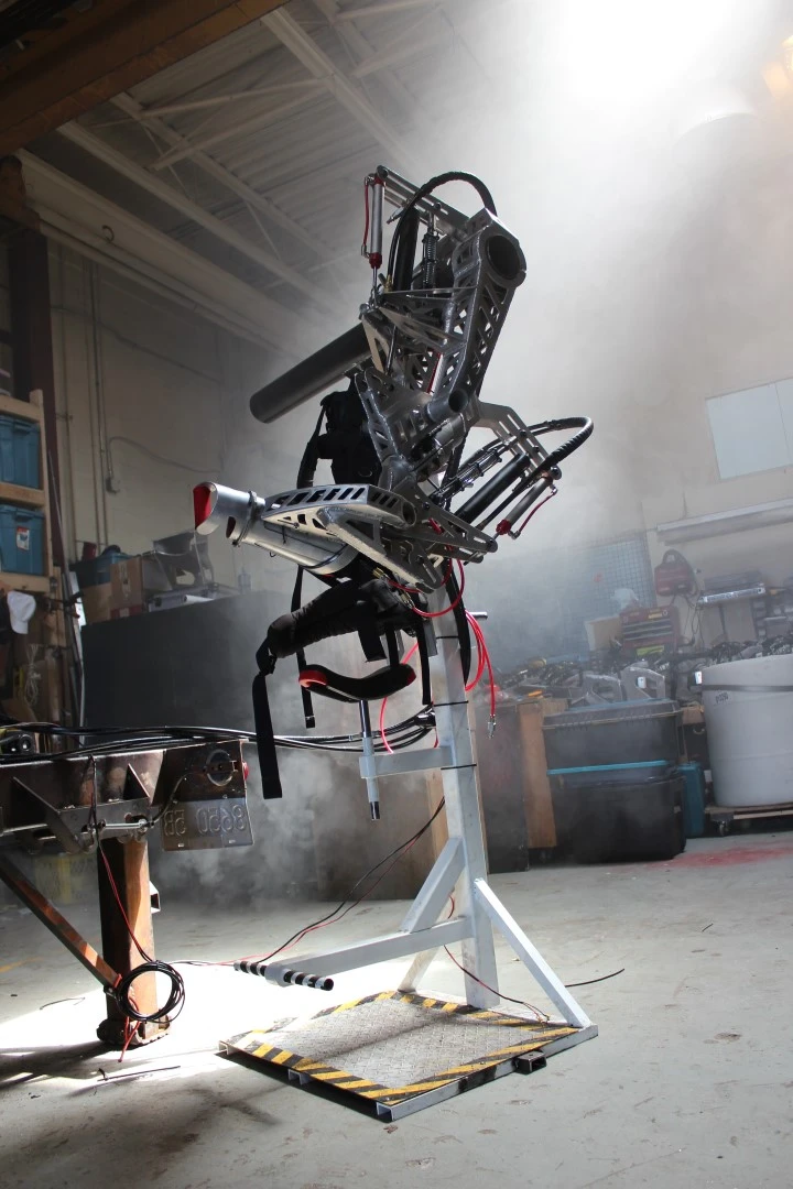 The pilot sits down, straps in, and slides their arm into the gauntlet (Photo: Anti-Robot)