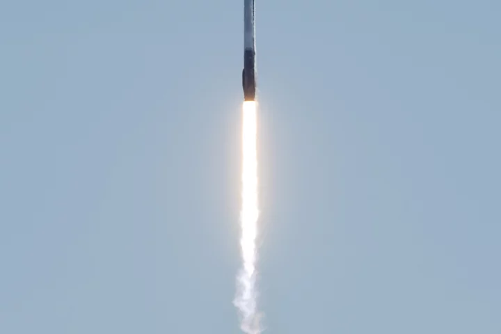 A SpaceX Falcon 9 rocket carrying the company's Crew Dragon spacecraft is launched on Axiom Mission 1 (Ax-1)