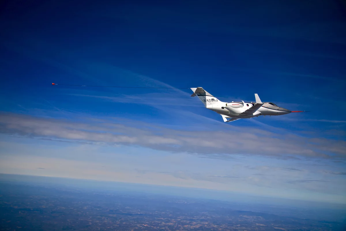 The HondaJet tows an airspeed calibration cone during flight testing (Photo: Honda)