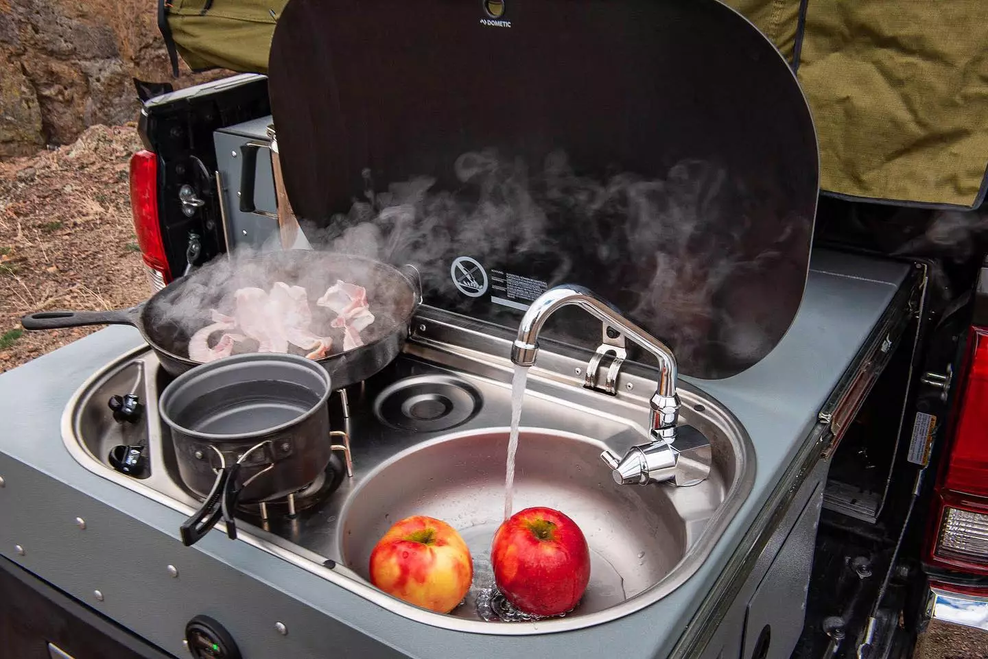 Dometic kitchen hardware includes a dual-burner stove, sink and fridge drawer