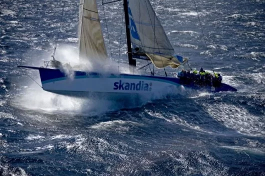 SKANDIA launches off a wave near Tasman Island Photo: Carlo Borlenghi