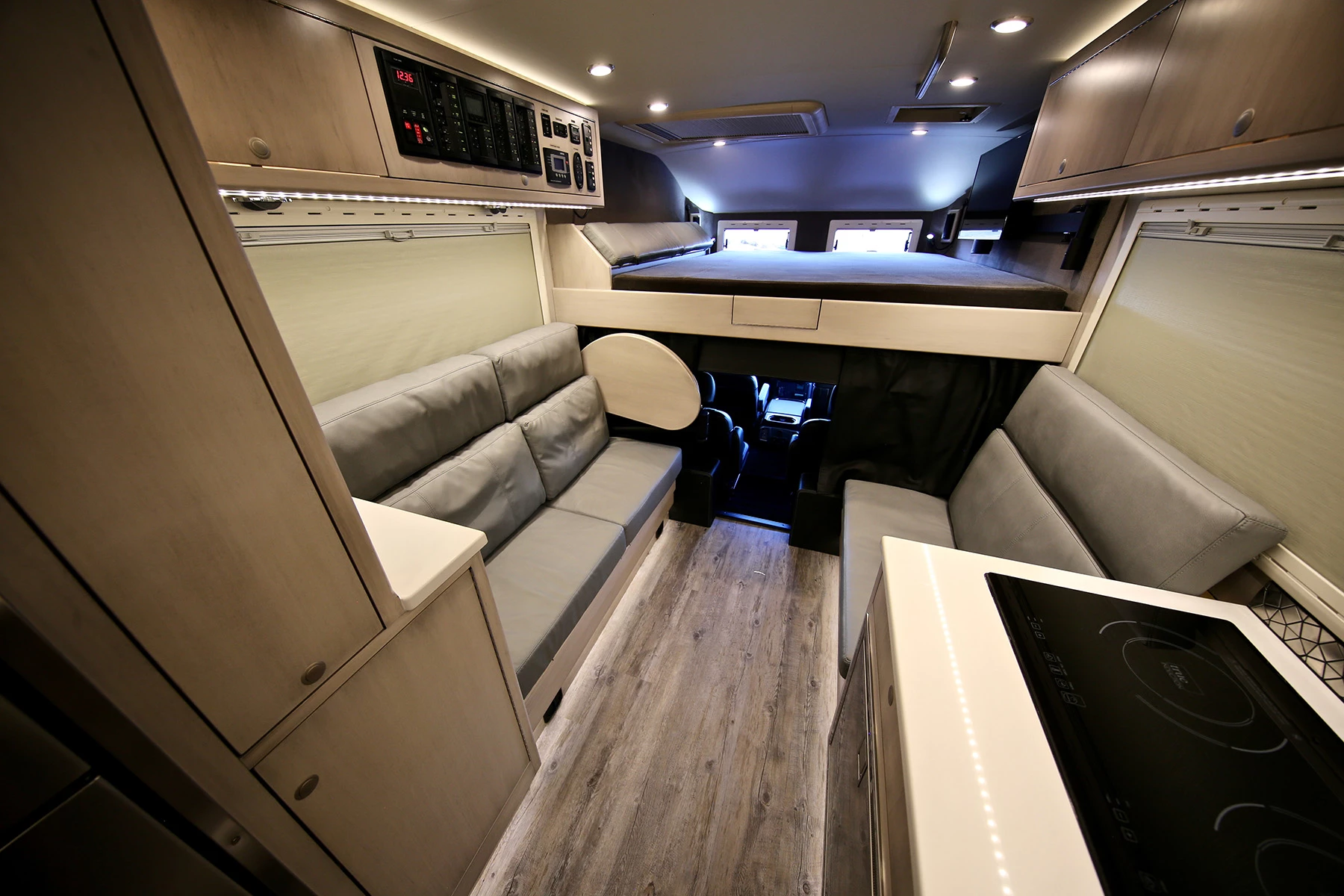 The Crestone floor plan has a medium sofa across from a small sofa
