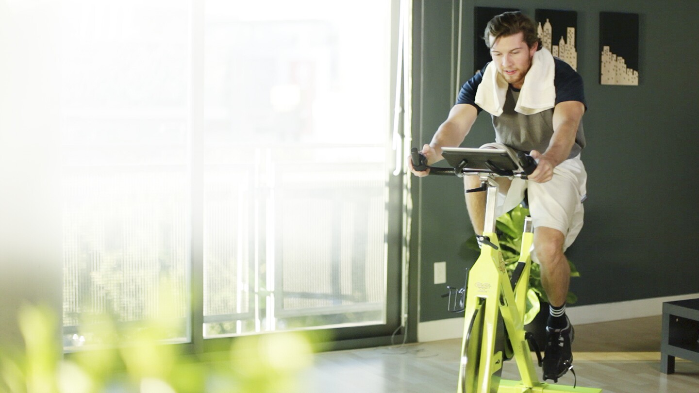 Two wireless controllers can be strapped to common cardio equipment such as exercise bikes and elliptical trainers