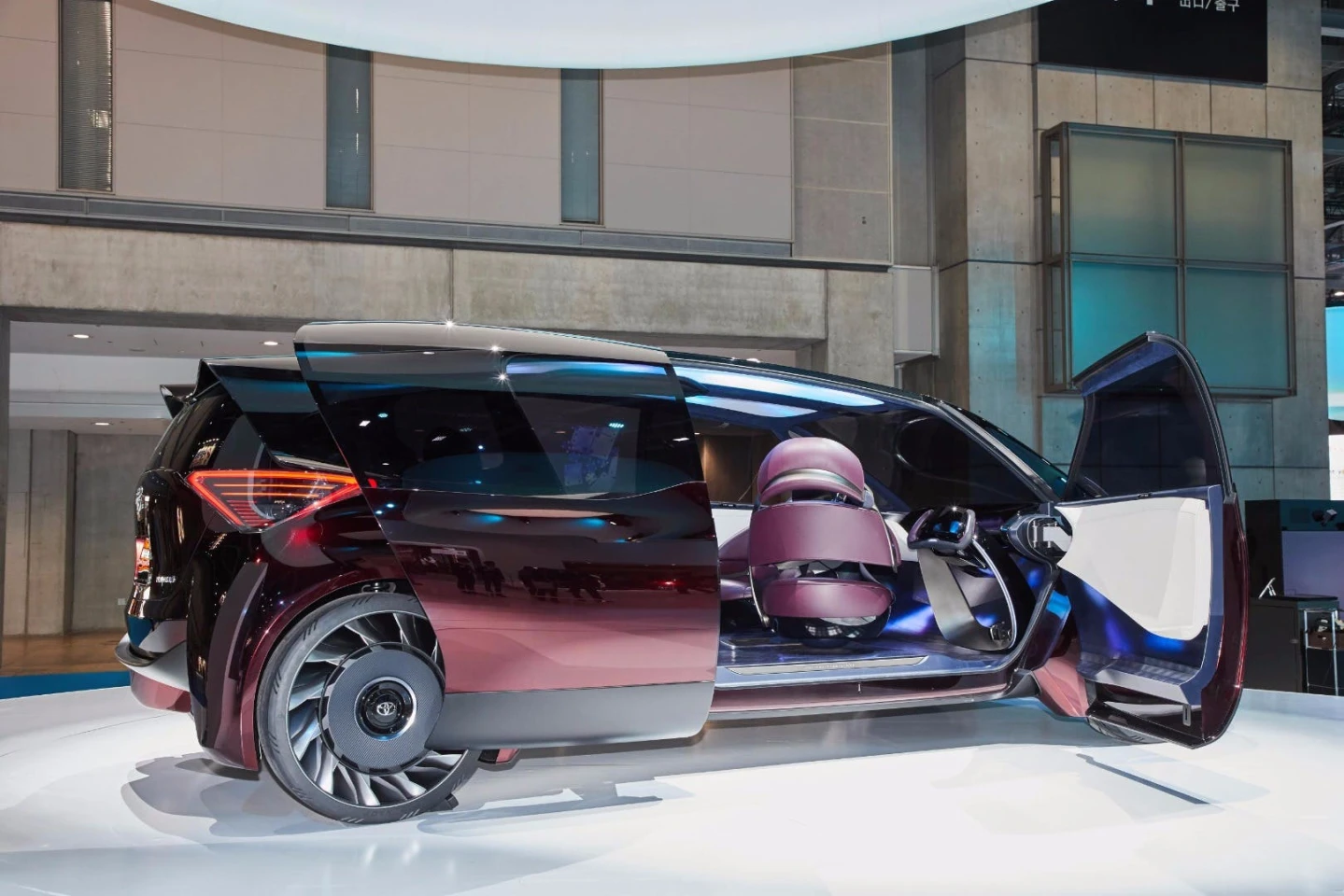 Both the Fine-Comfort Ride and Tj Cruiser concepts use traditional front and sliding rear doors ... but toward very different ends