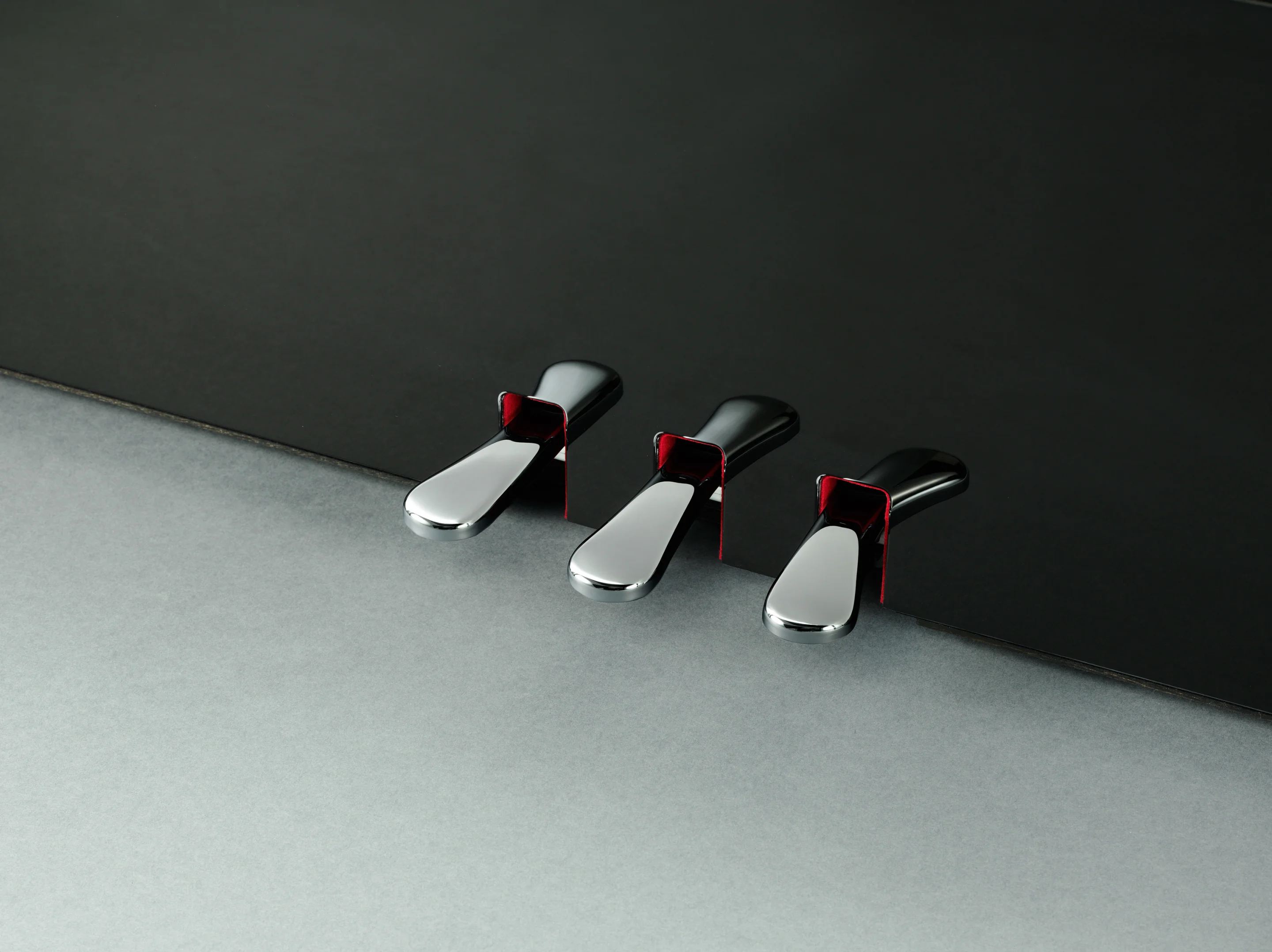 There's a damper pedal (regular piano sustain) with half pedal effect, a sostenuto (for sustaining pressed notes, such as chords, while other notes are played staccato), and a soft pedal (for knocking the volume down a tad, while also slightly altering the timbre of the notes)