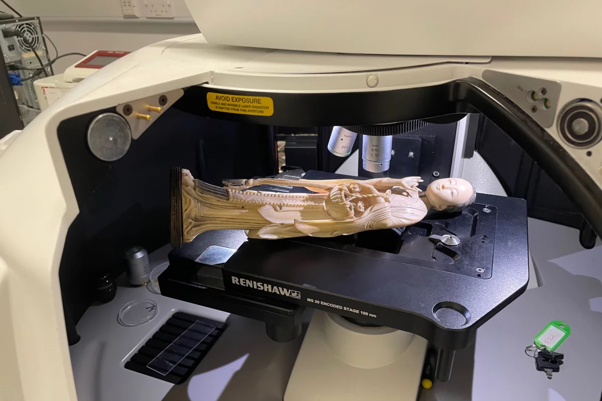 An ivory figurine undergoes Raman spectroscopy analysis as part of the study
