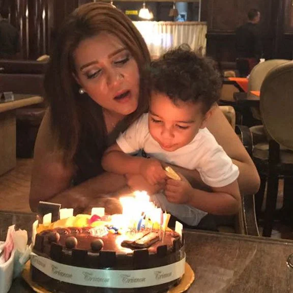 The currently imprisoned Egyptian mother, Amal Fathy with her child