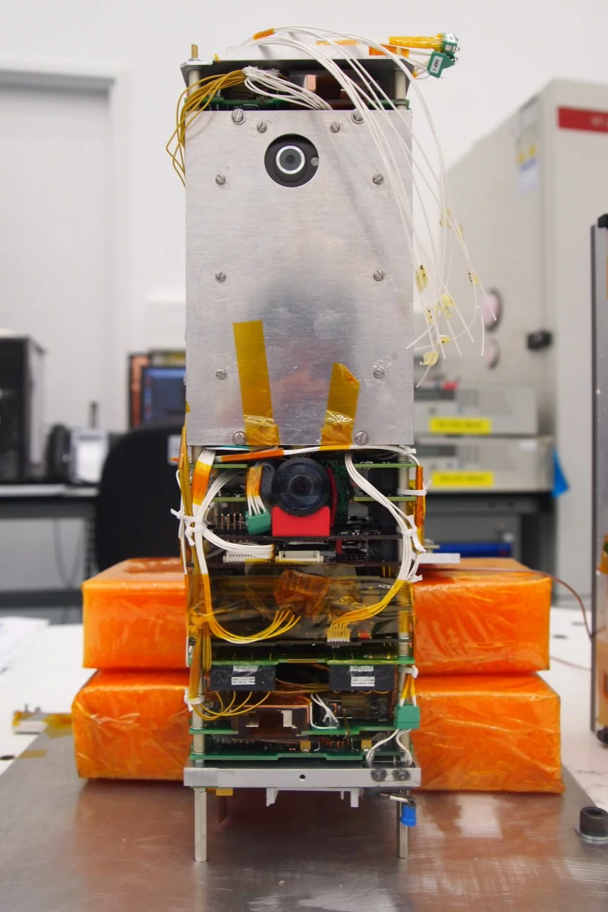 STRaND-1 with smartphone camera peeping out of the porthole at the top of the stack.