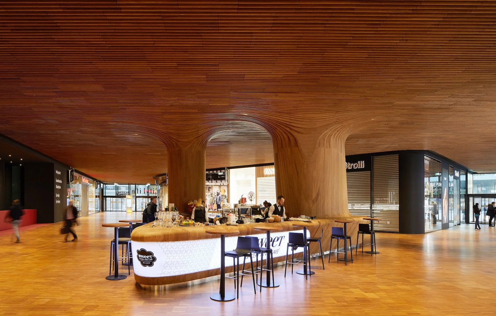 The Generali Tower includes an adjacent shopping center and homes, both designed by ZHA too