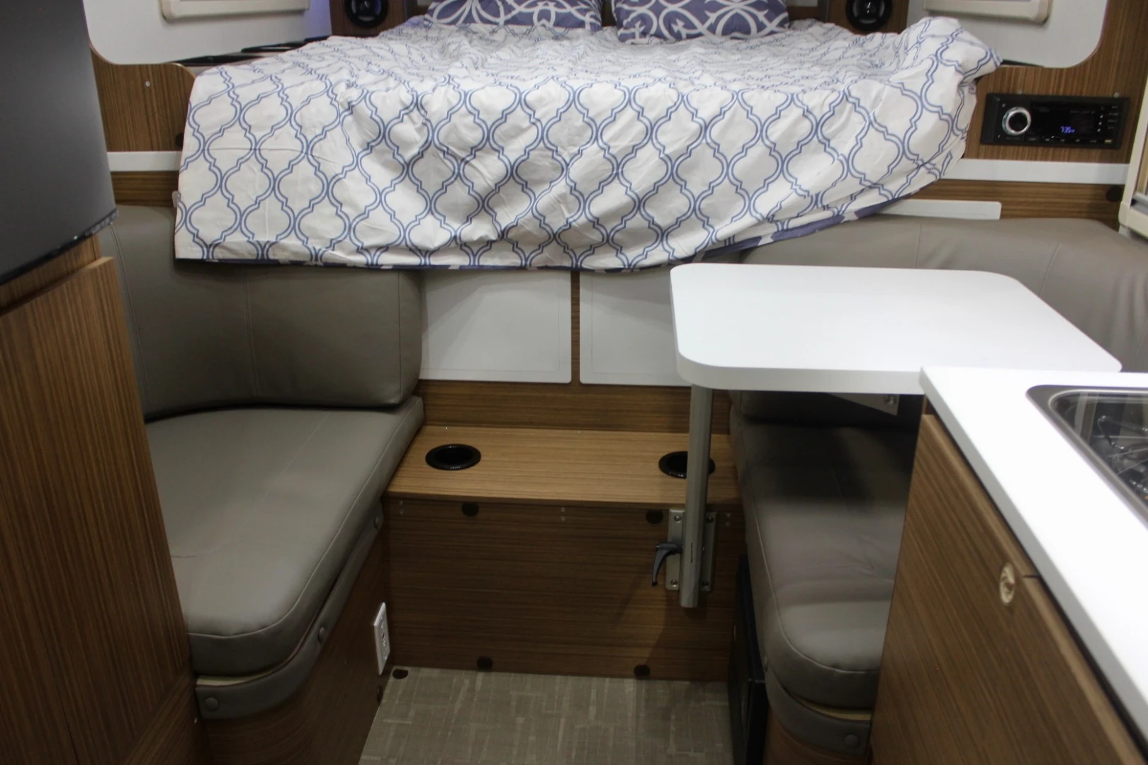 Inside, the T@b trailer has a functional little layout with rear bed and compact, two-person dining area just in front of the foot