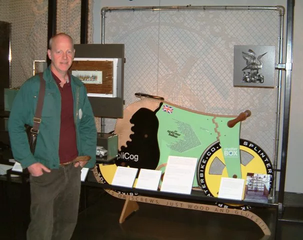Michael Thompson next to the original SplinterBike when it was on display at the Victoria & Albert Museum in London, as part of the Power of Making exhibition