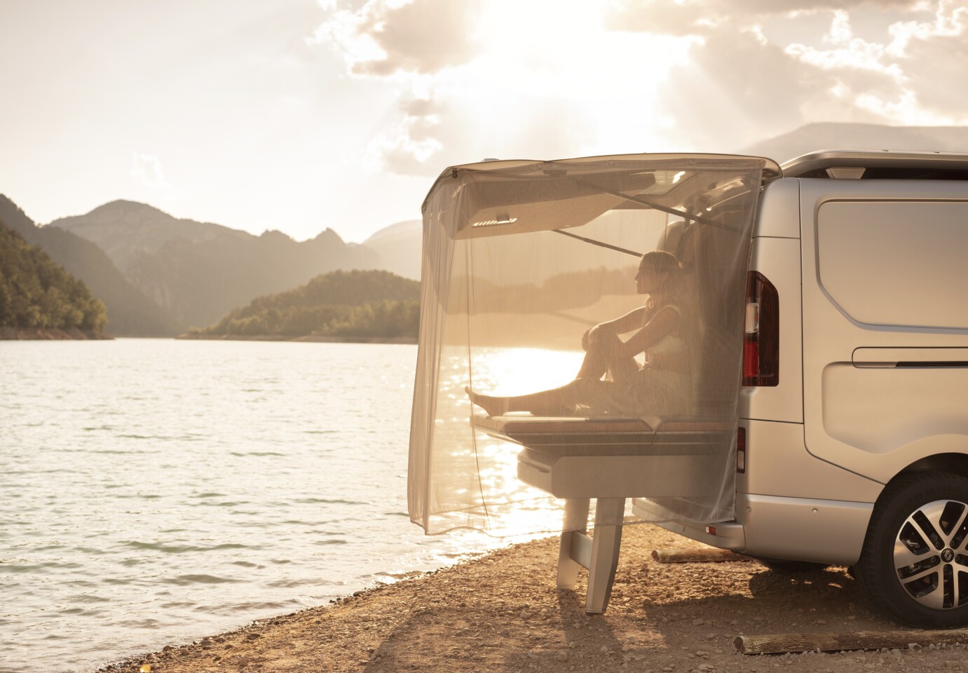 The Hippie slide-out bed creates a day cabana out the tailgate