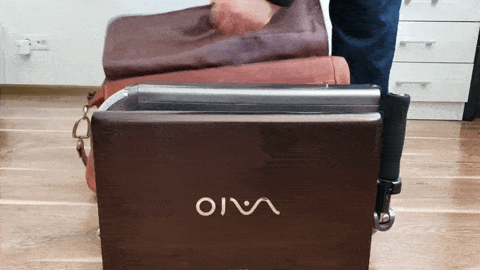 The BooZter folds down for between-ride transit in a backpack or laptop bag